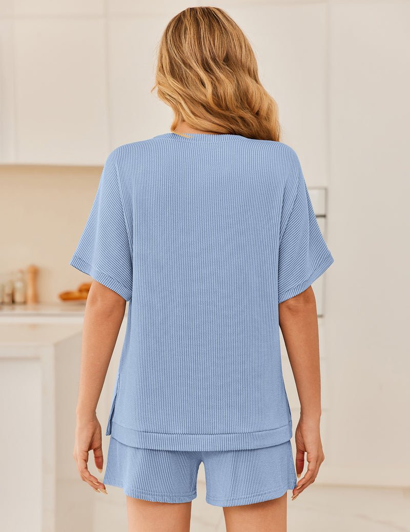 Back view: ribbed 2-piece lounge set with short-sleeve top and shorts, baby blue