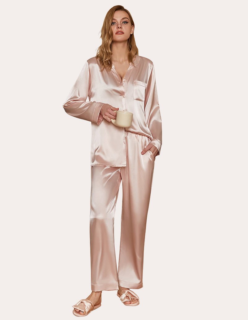 Champagne satin pajama set with long sleeves and button-down top, matching pants