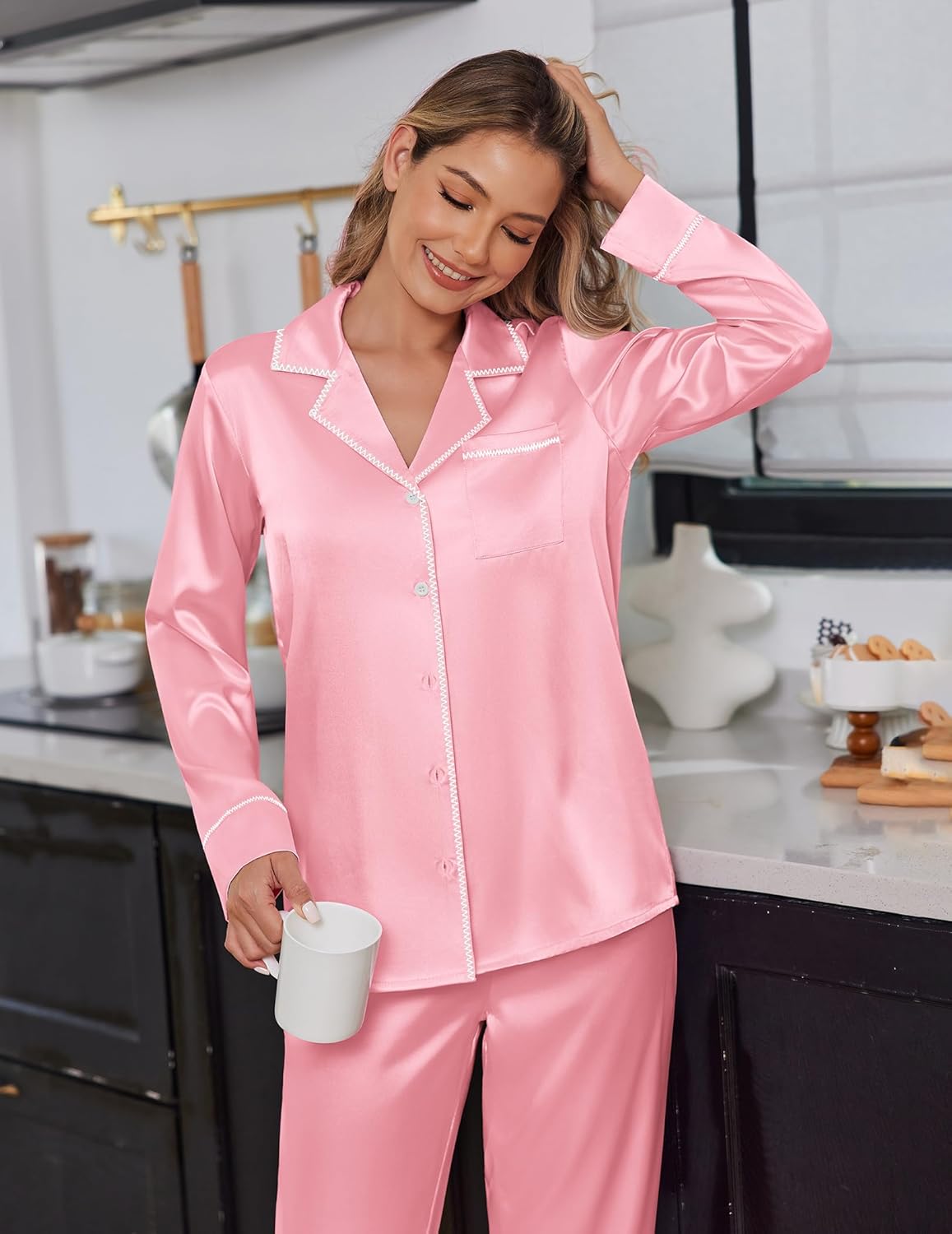 Light pink satin pajama set with contrast piping and button-down pajama top