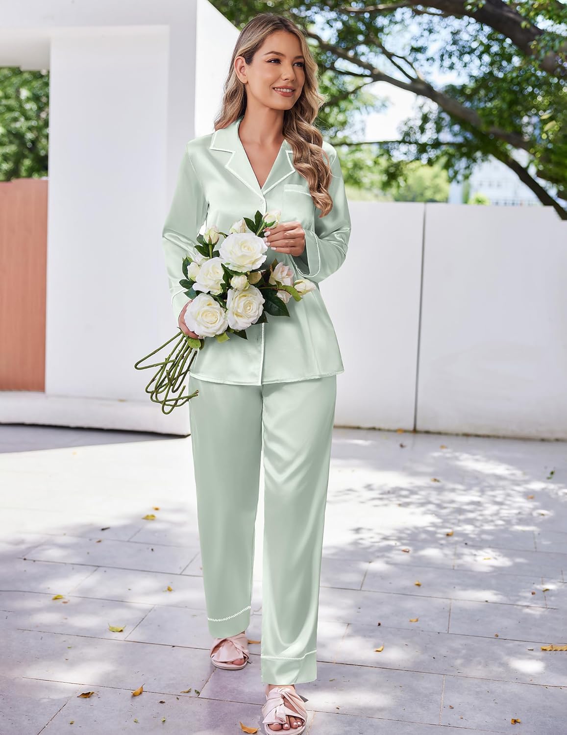 Light green satin pajama set with button-front top and matching long pants