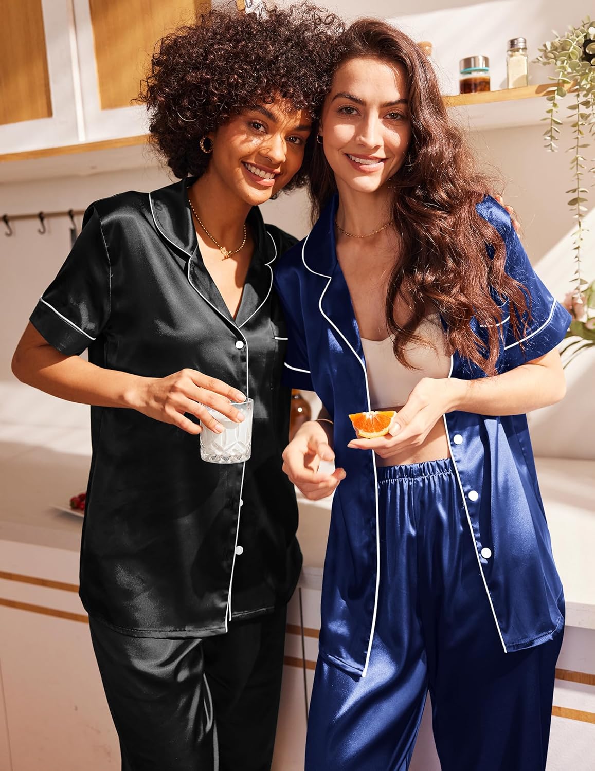 Satin pajama set with short sleeves and button front; black and blue lounge pants