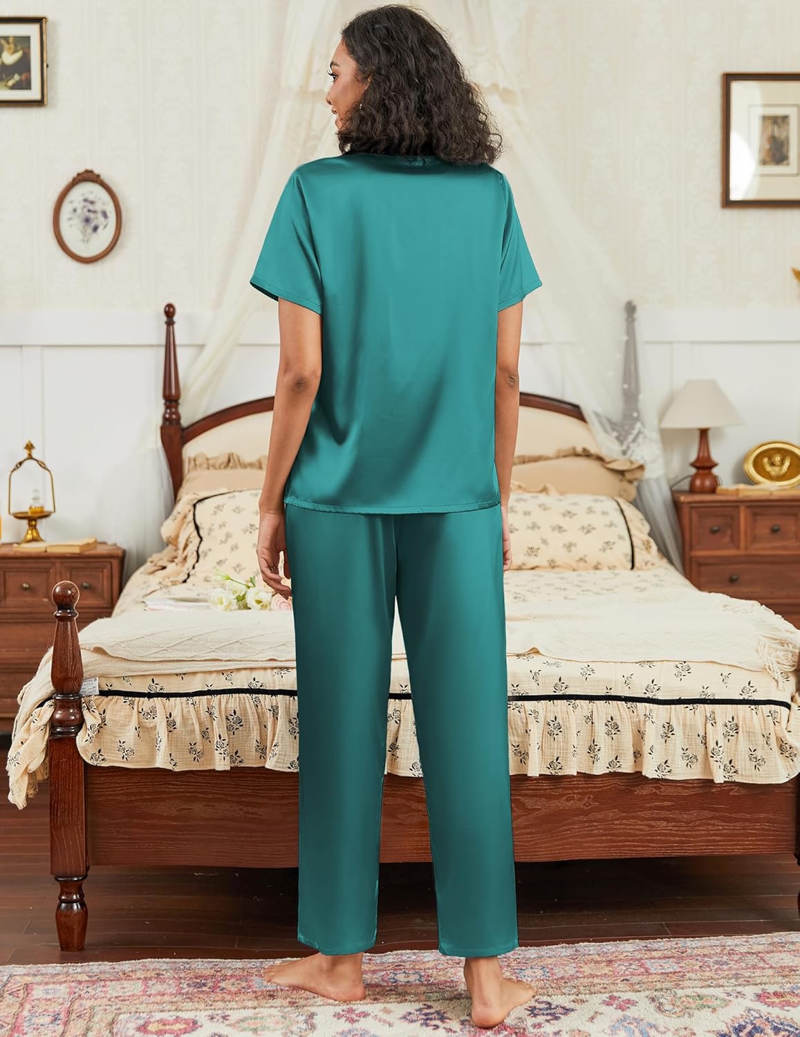 Teal satin pajama set with short-sleeve button top and matching wide-leg pants, back view