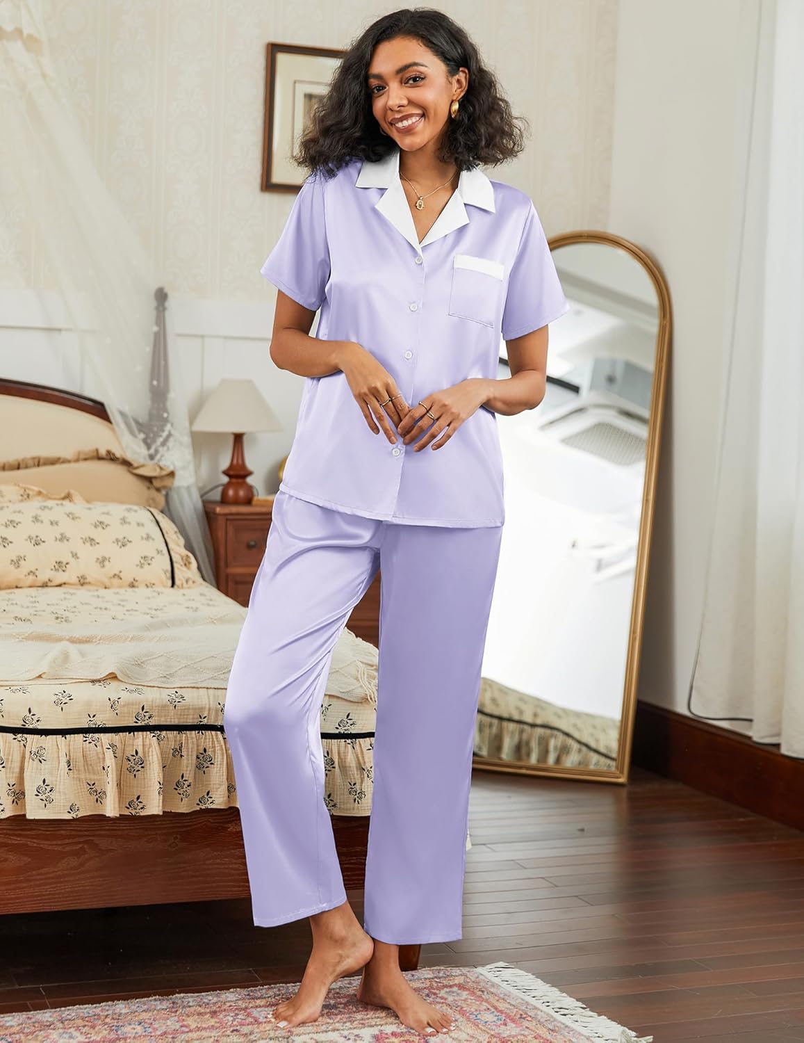 Satin pajama set in lavender with short-sleeve button-down top and matching straight pants