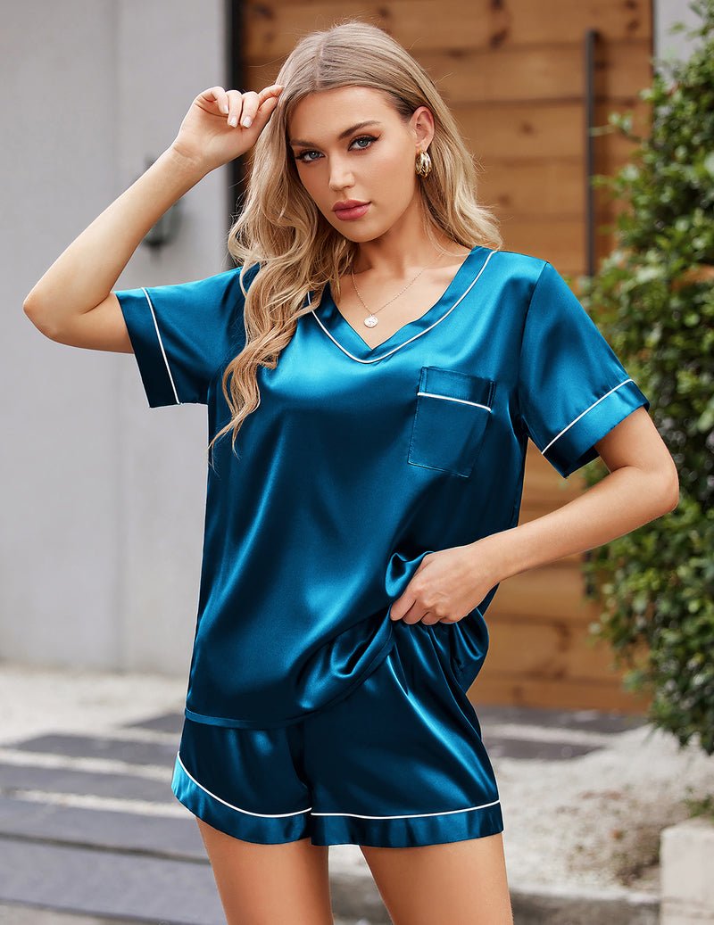 Blue satin short-sleeve pajama set with V-neck trim and drawstring waist shorts