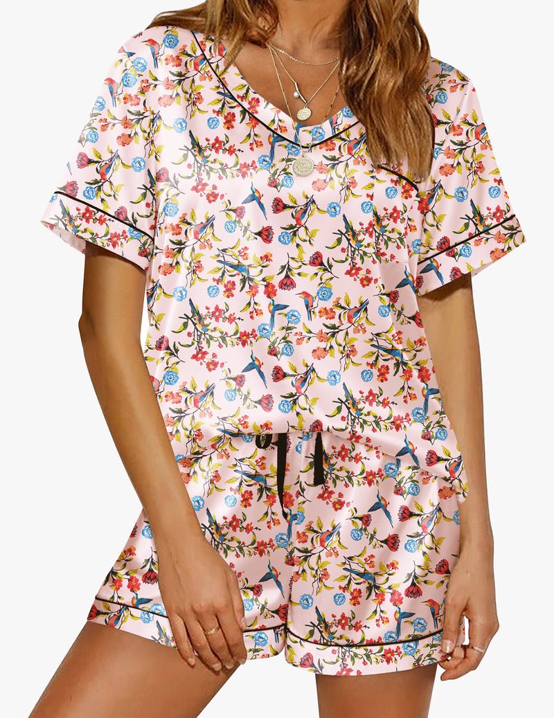 Floral satin pajama set with short sleeves, V-neck trim, and matching shorts