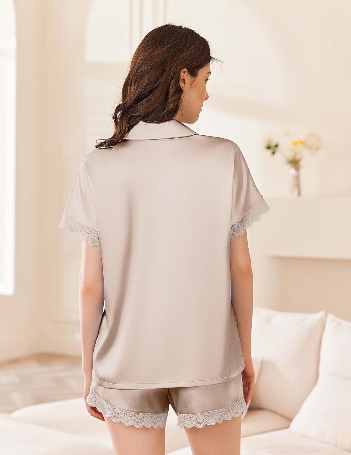 Champagne satin pajama set back view, short-sleeve button shirt and lace-trim shorts