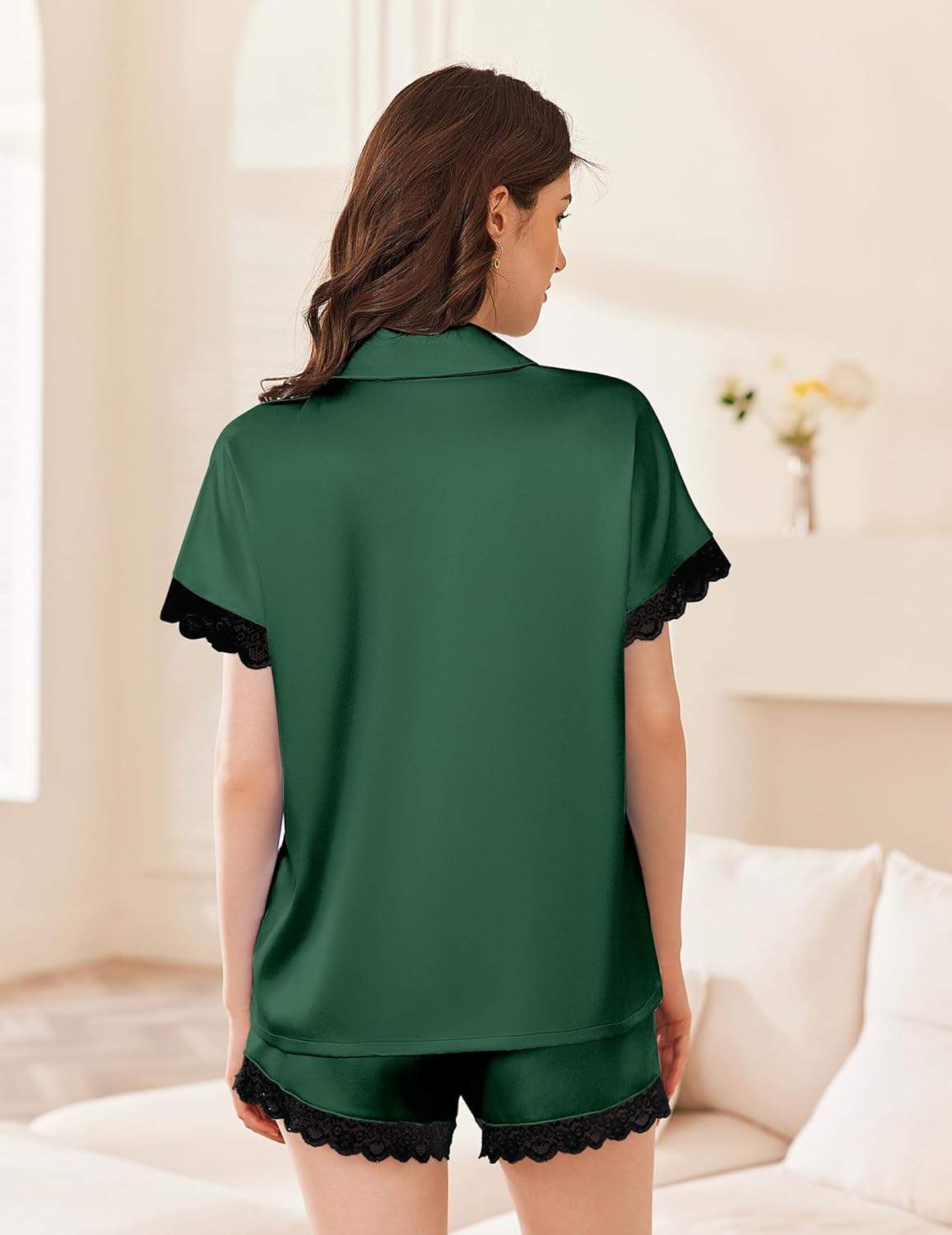 Green satin pajama set with short-sleeve button top and lace-trim shorts, back view