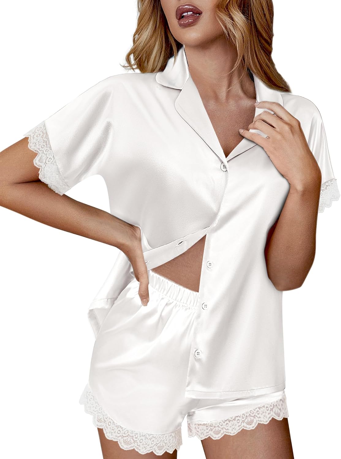 White satin pajama set with short button-front top and lace-trimmed shorts