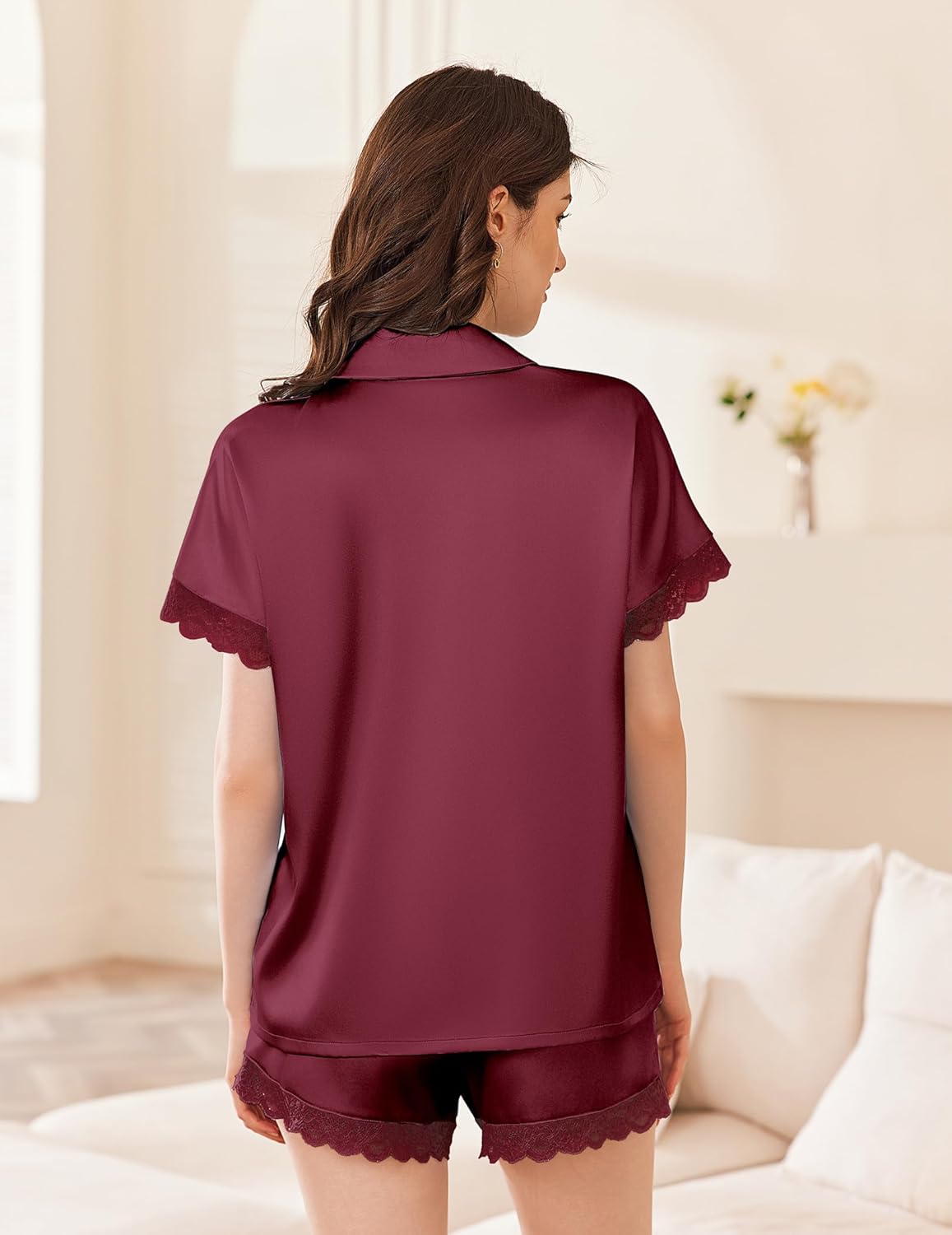 Satin silk pajama set with lace-trimmed shorts, dark maroon button-up top and shorts