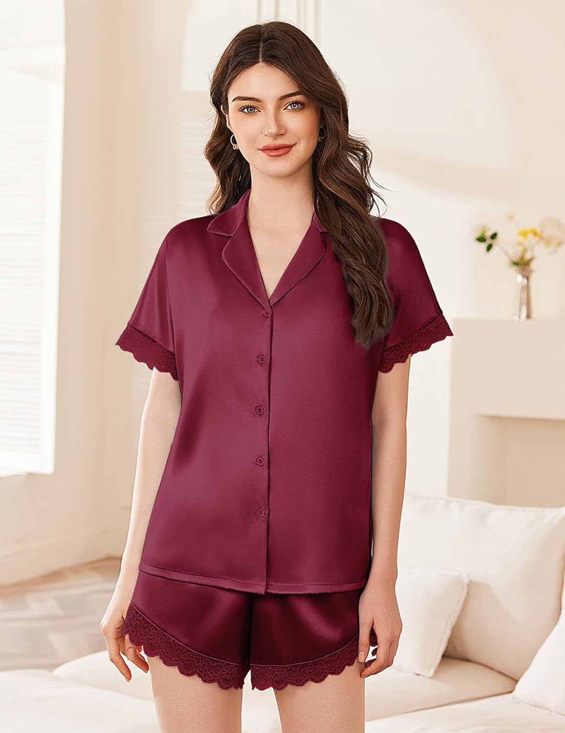Satin silk pajama set with lace-trimmed shorts, burgundy button-up top and shorts