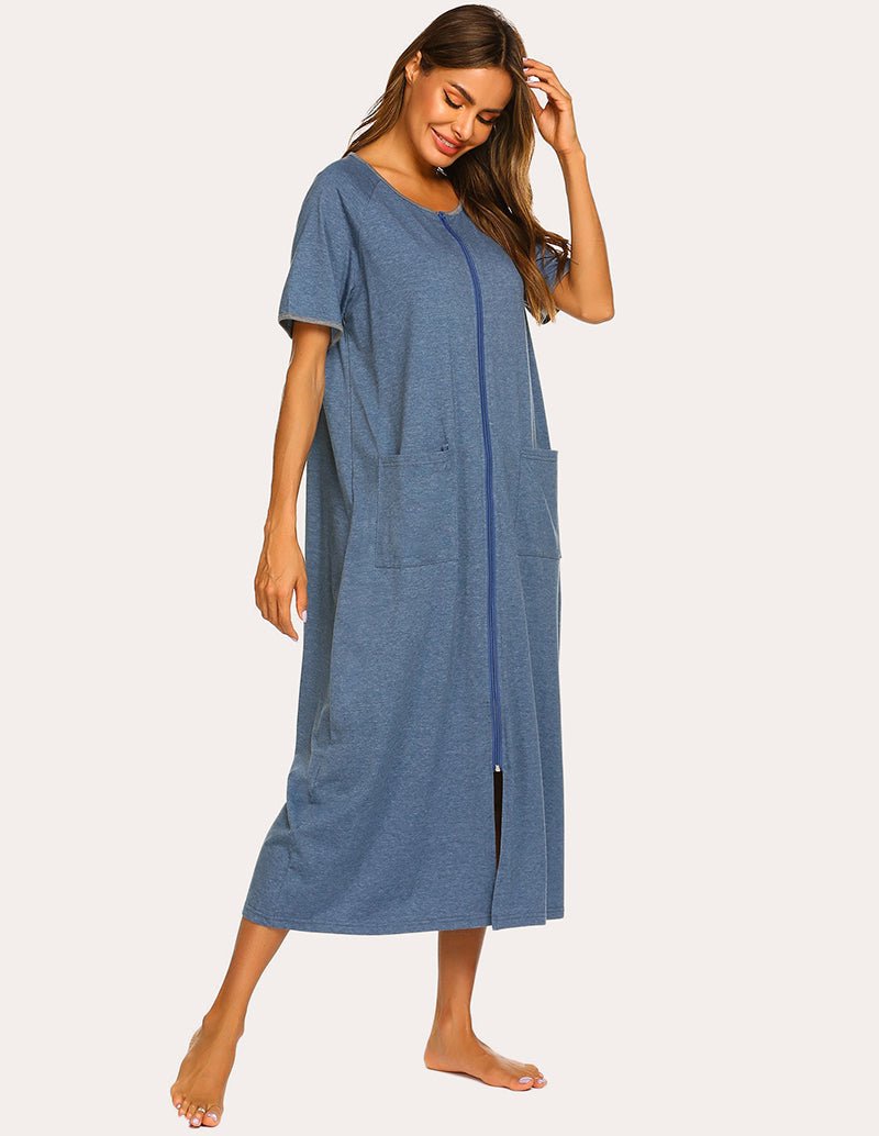 Blue short-sleeve loungewear dress with front zip, side pockets, and long center slit