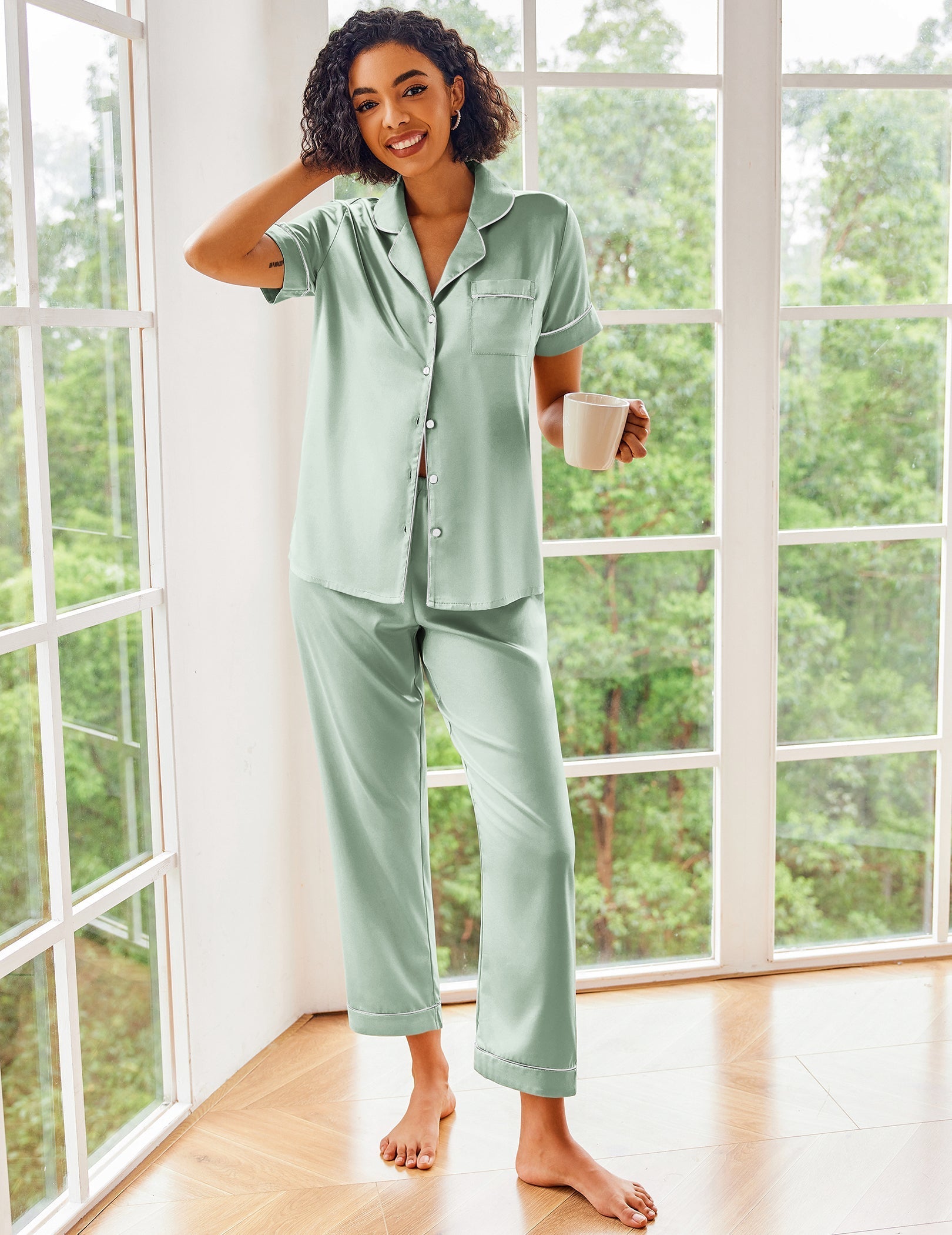 Light green silk satin pajama set with short sleeves, button-up top and ankle pants