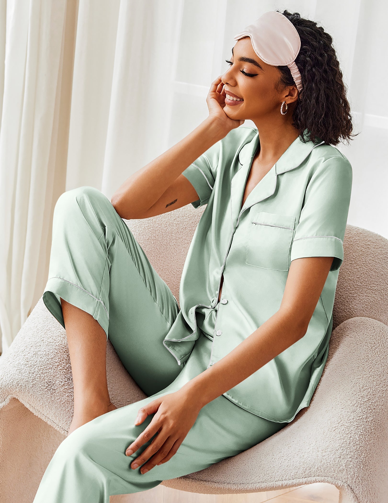 Light green satin pajama set with short-sleeve button top, pants and head sleep mask