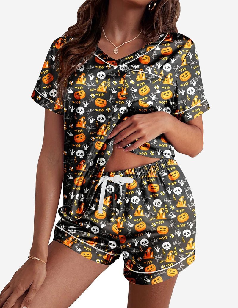 Black satin pajama set with orange Halloween prints: short-sleeve top and shorts