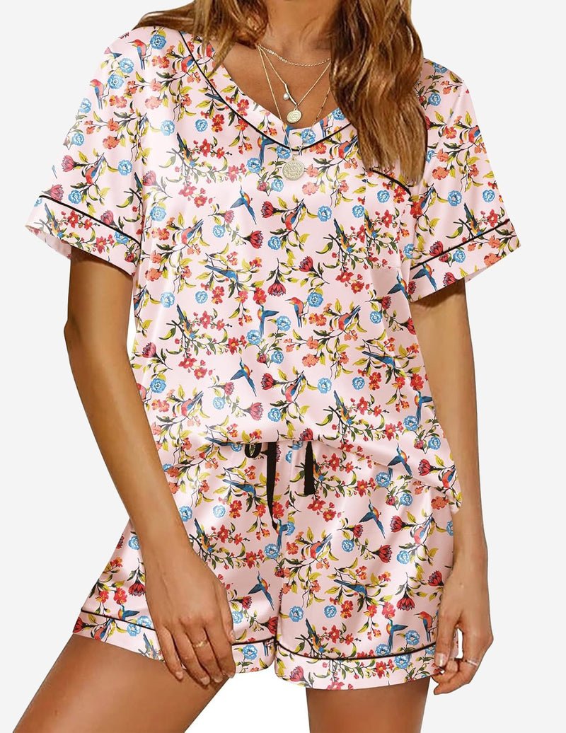 White floral satin pajama set: short-sleeve button top with matching shorts