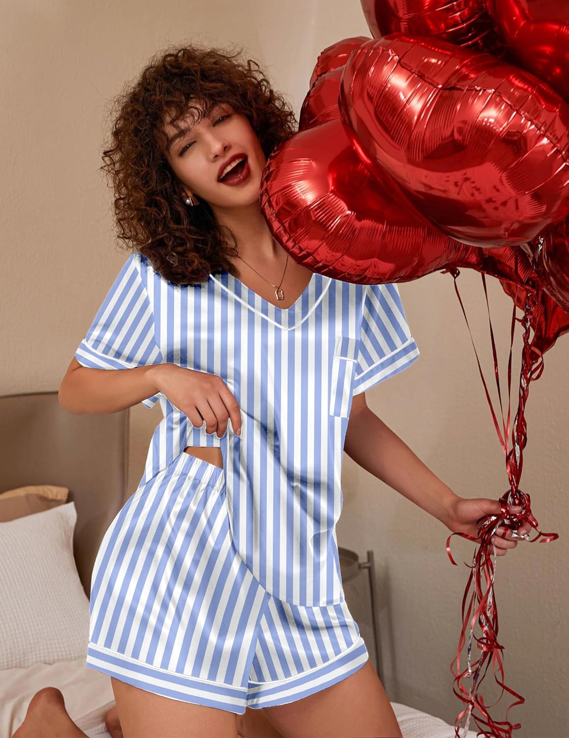 Silk pajama set, two-piece, light blue striped short-sleeve top and matching shorts