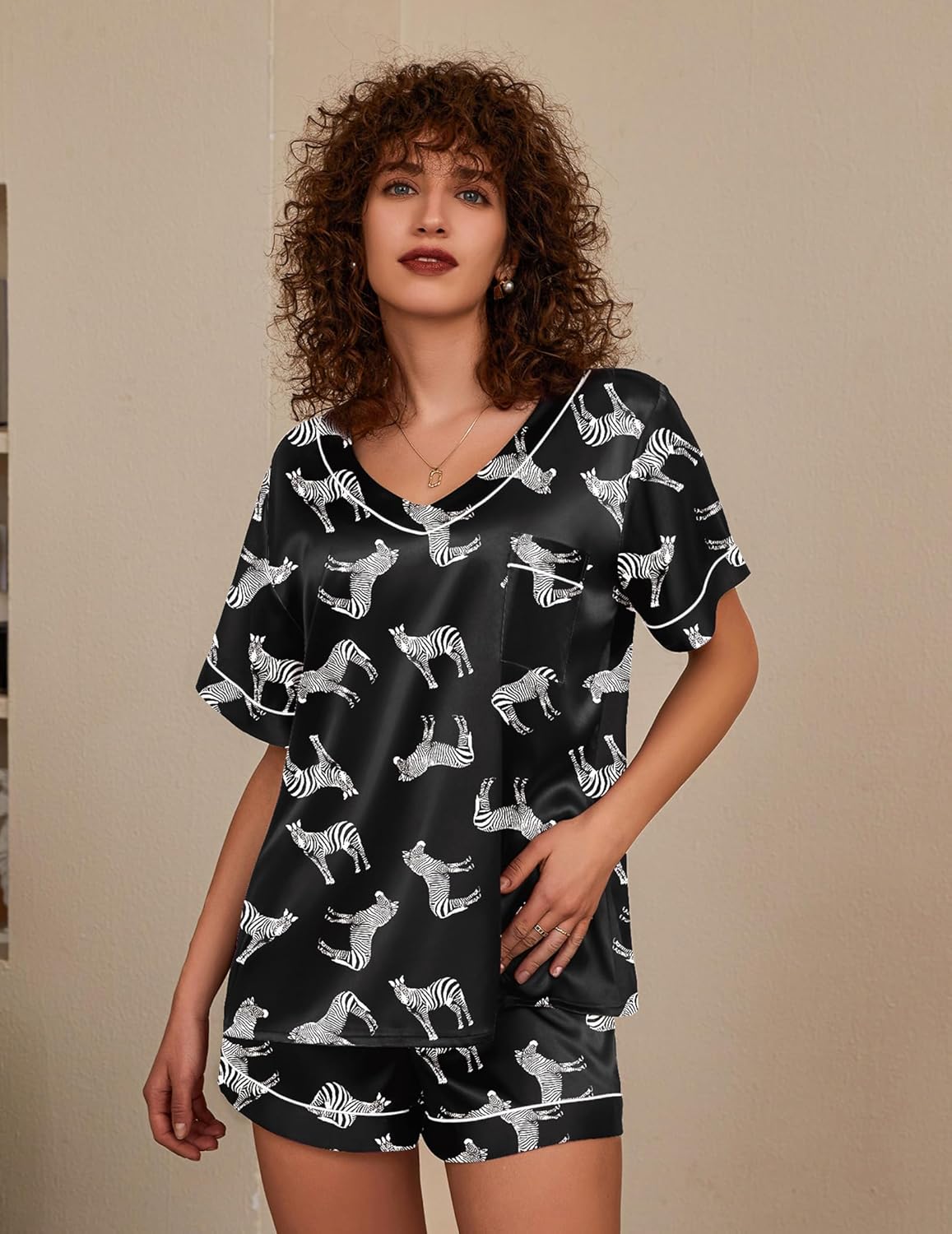 Silk pajama set, two-piece, black with zebra print, short-sleeve top and shorts