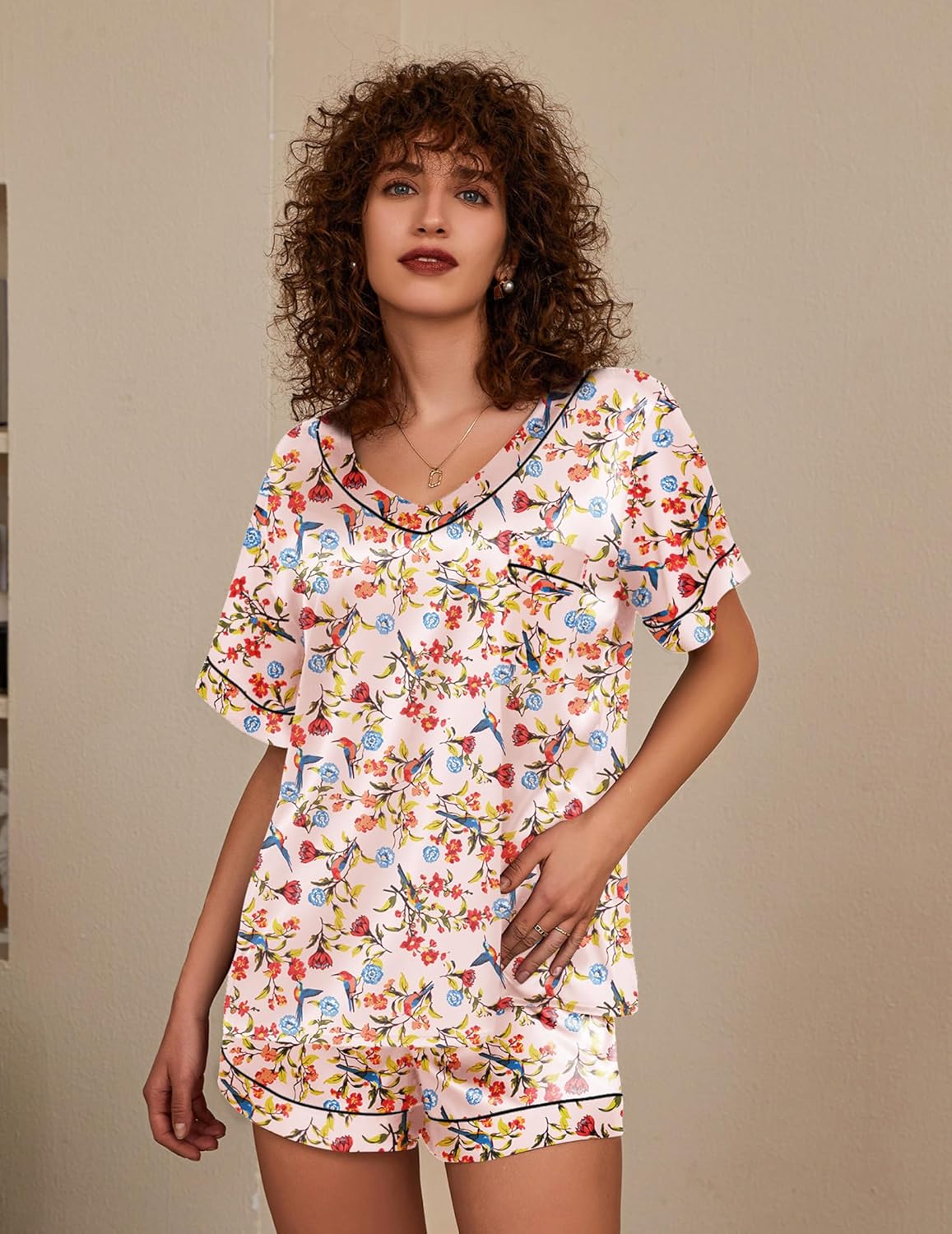 Silk pajama set, two-piece, white with colorful floral print and piped neckline