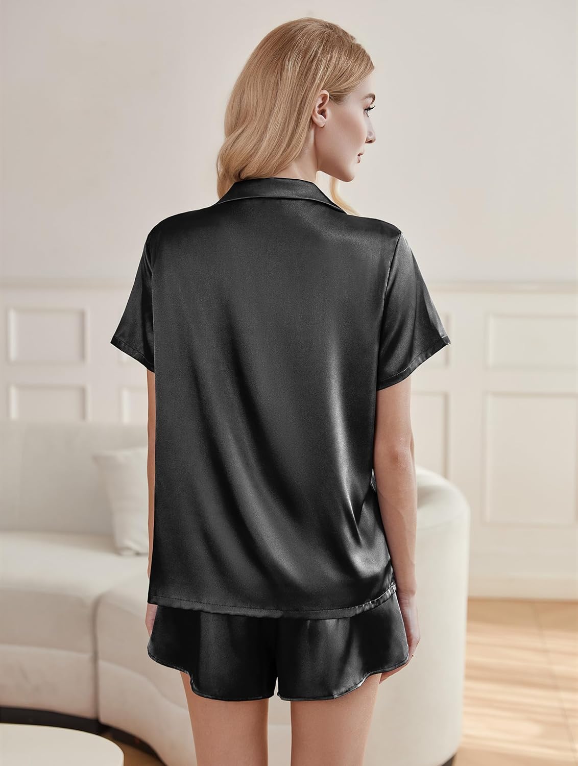 Silk pajama set, black short-sleeve button shirt and matching satin shorts (back view)