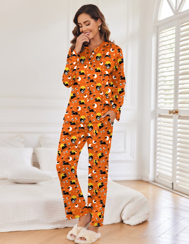 Orange Halloween patterned long-sleeve pajama set with button-front top and full-length pants