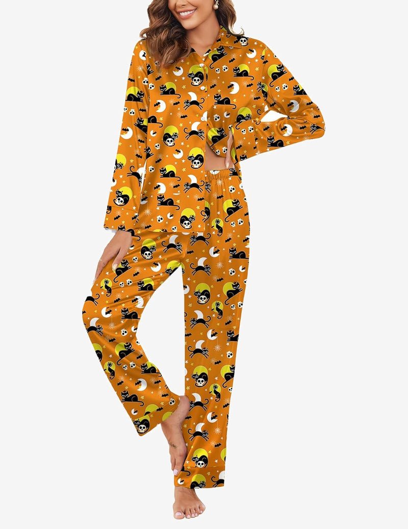 Silk satin pajama set in orange with cartoon Halloween print, long sleeves and pants