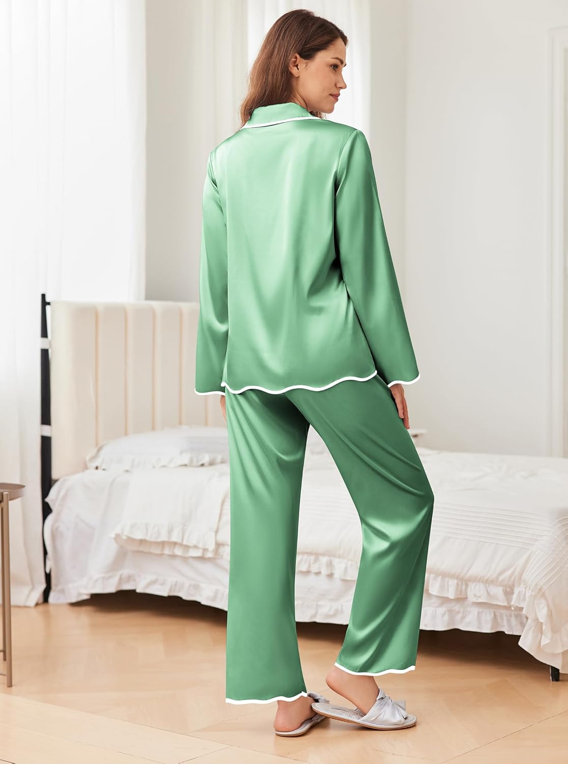 Green silk satin pajama set with white piping, button-up top and straight-leg pants (back)