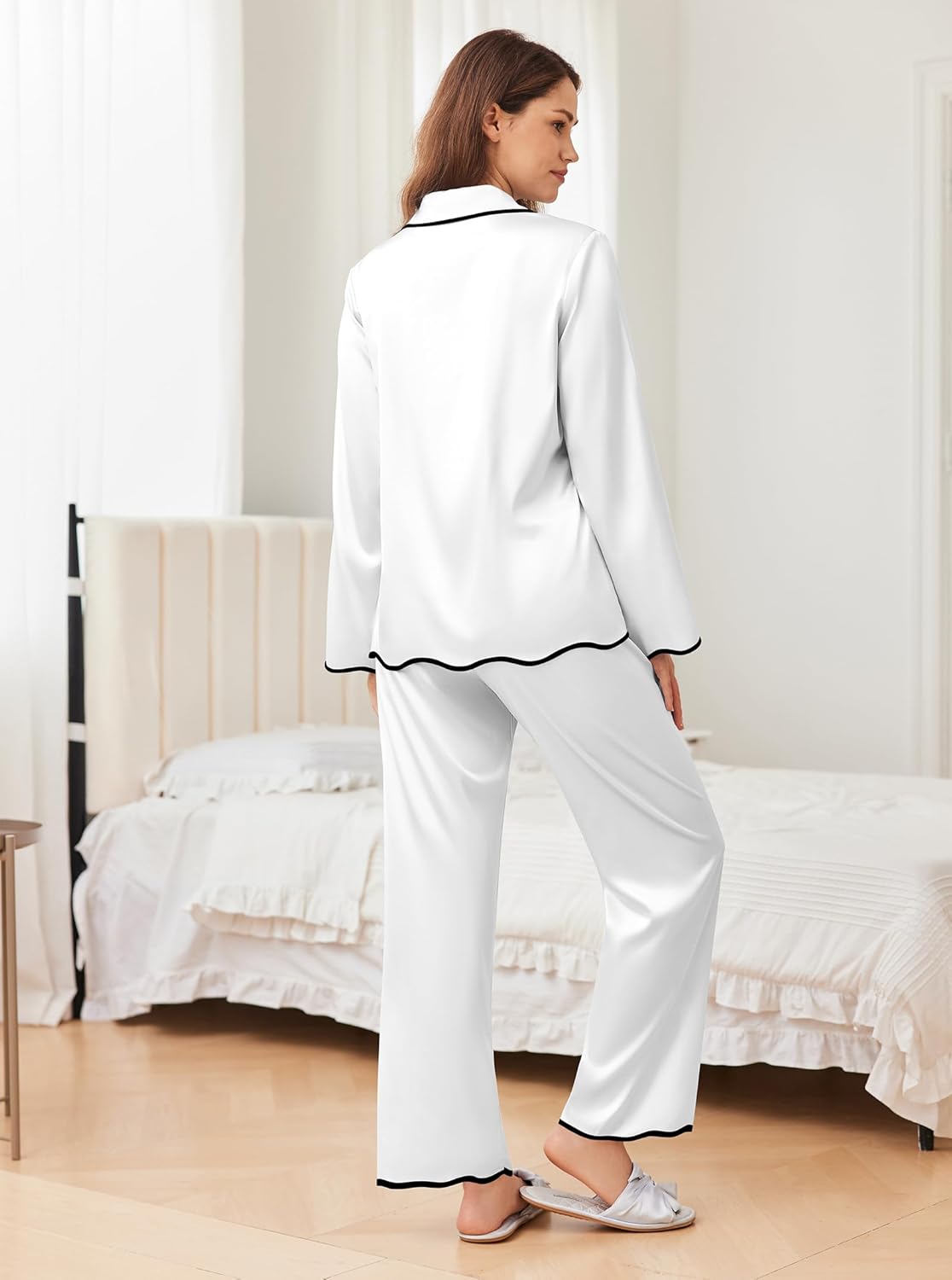 Back view: white satin pajama set with contrast piping on top and straight long pants