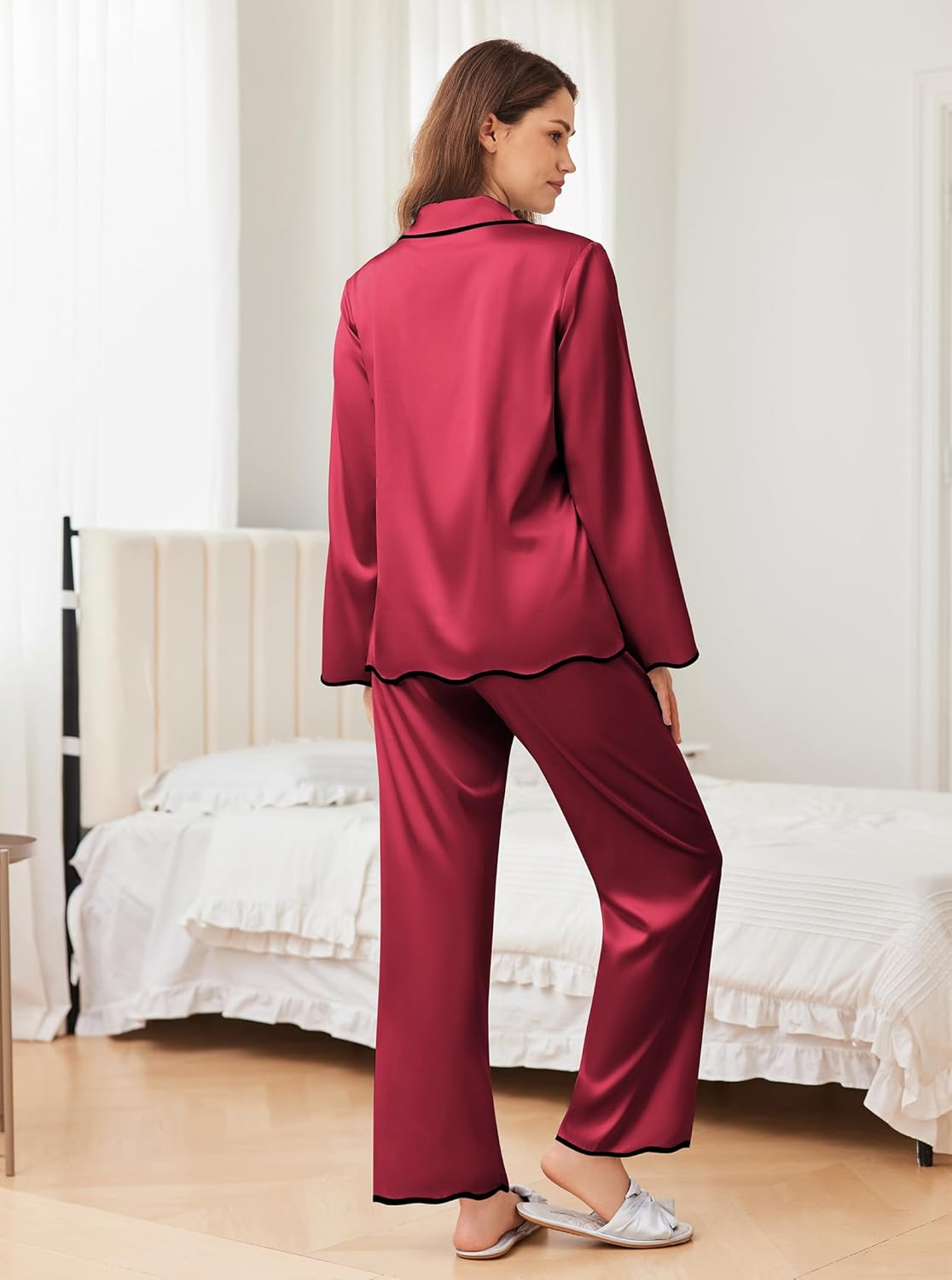 Back view: wine red satin pajama set with long sleeves and flowing straight-leg pants