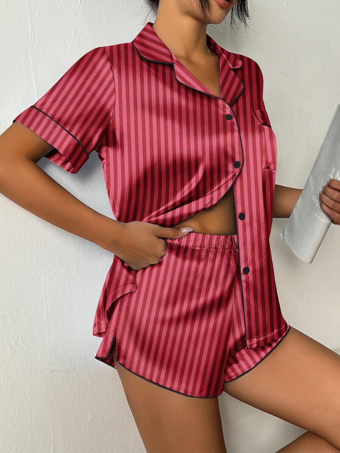 Fuchsia striped satin pajama set with button-top and matching shorts, contrast piping