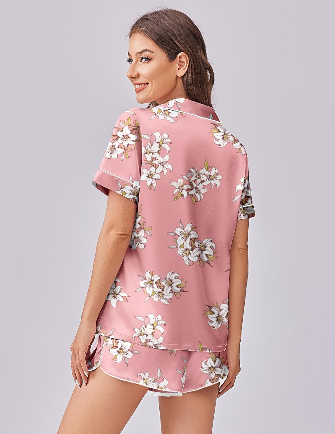Pink floral satin pajama set with matching shorts, button-up top back view