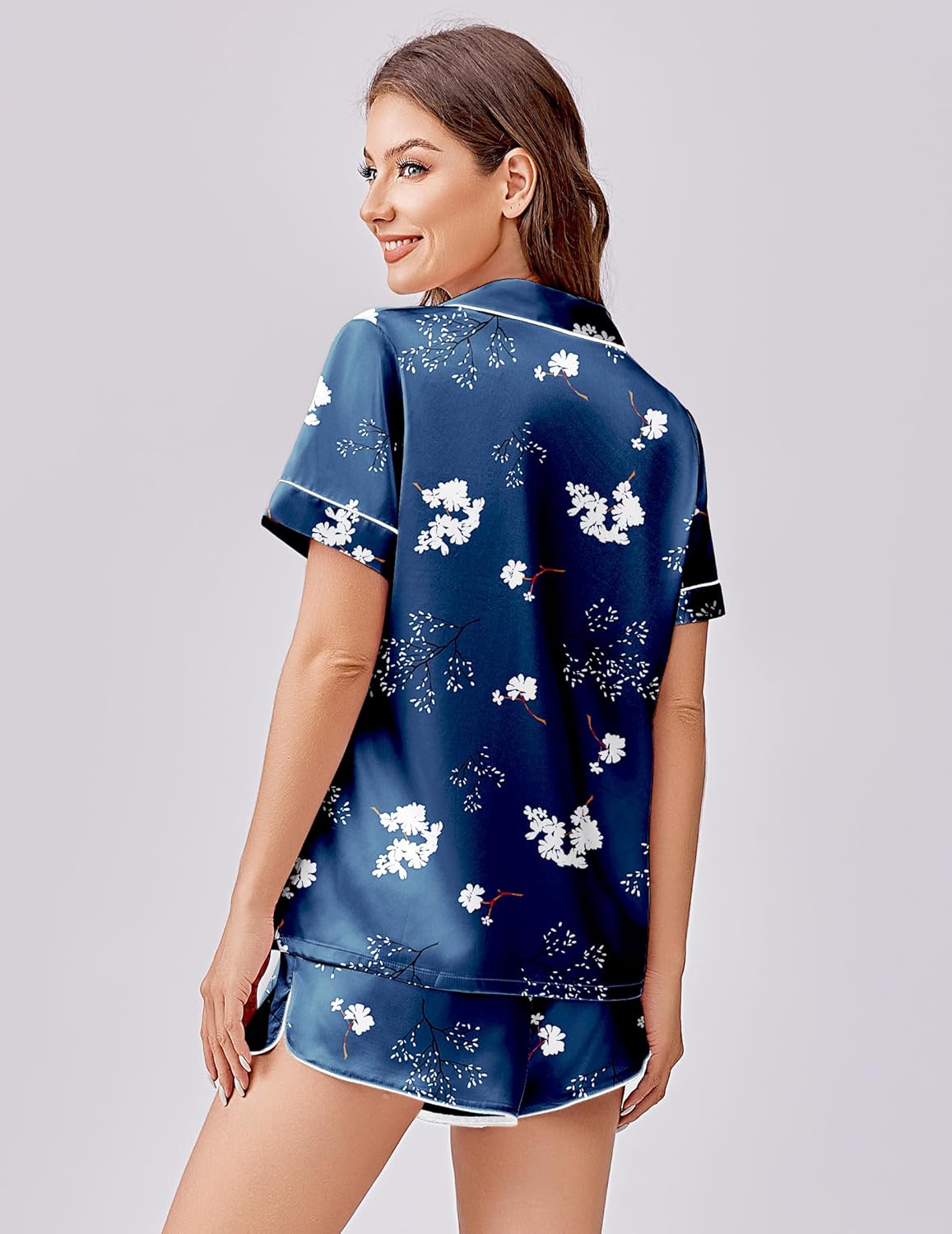 Navy floral satin pajama set, short-sleeve shirt and shorts shown from behind