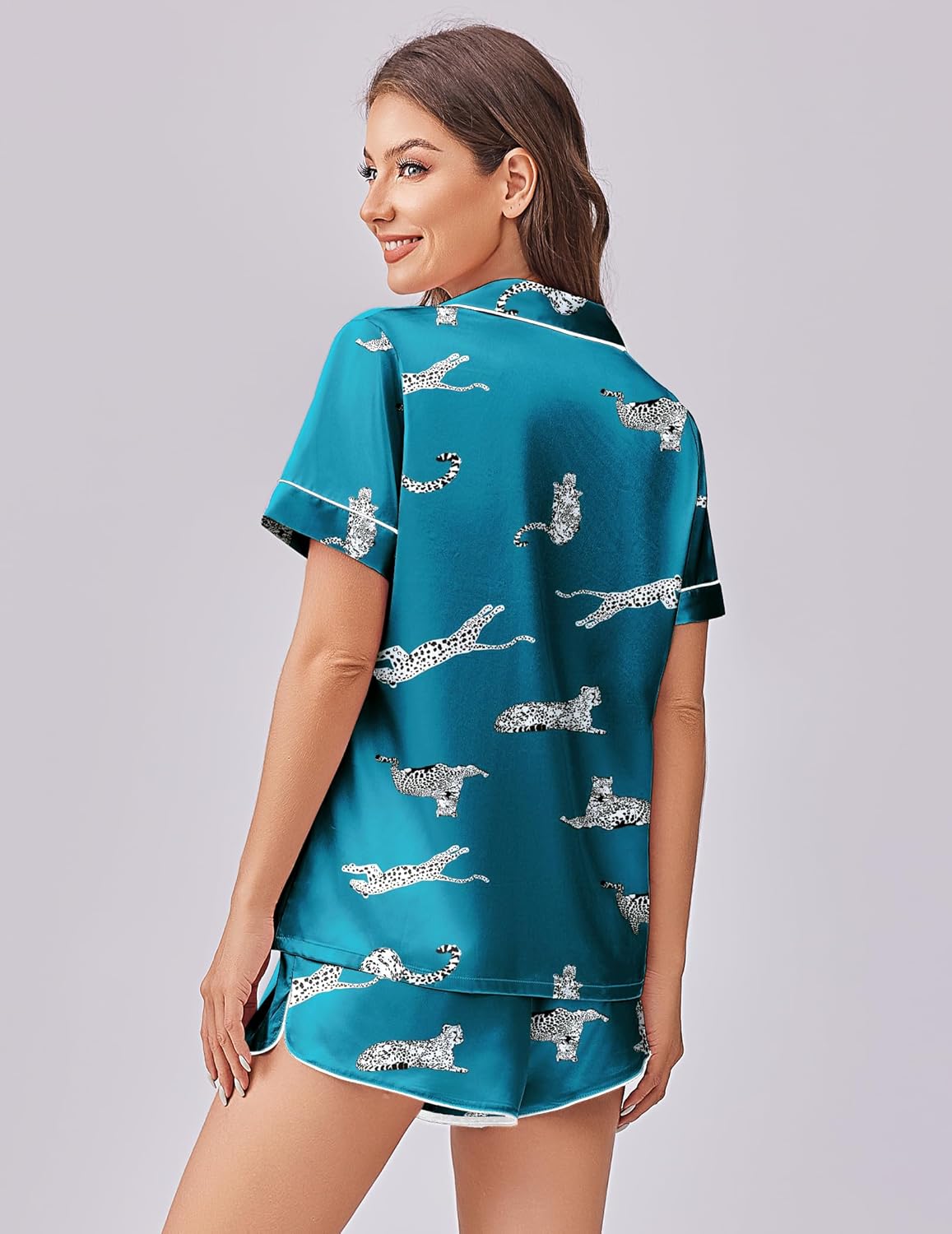 Turquoise satin pajama set with dog-print short-sleeve top and matching shorts