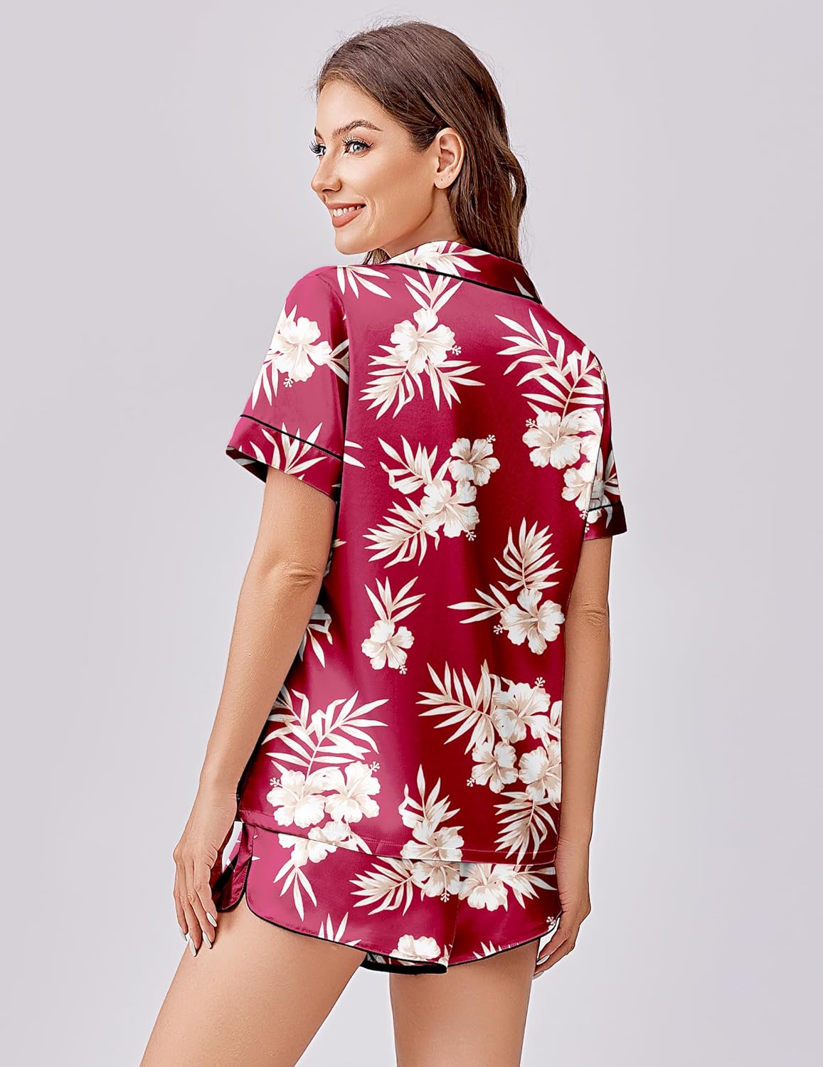 Burgundy satin pajama set with white hibiscus-style floral print short top and shorts