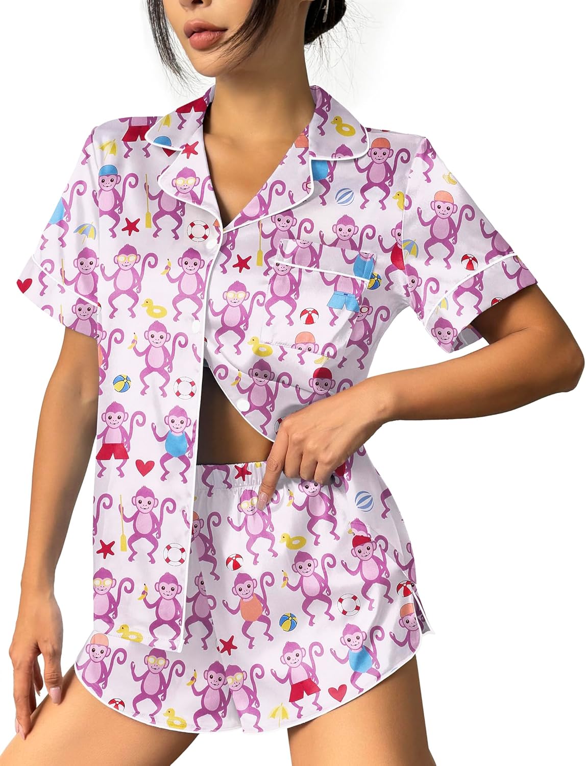 Light pajama set with colorful monkey print, short-sleeve button top and matching shorts