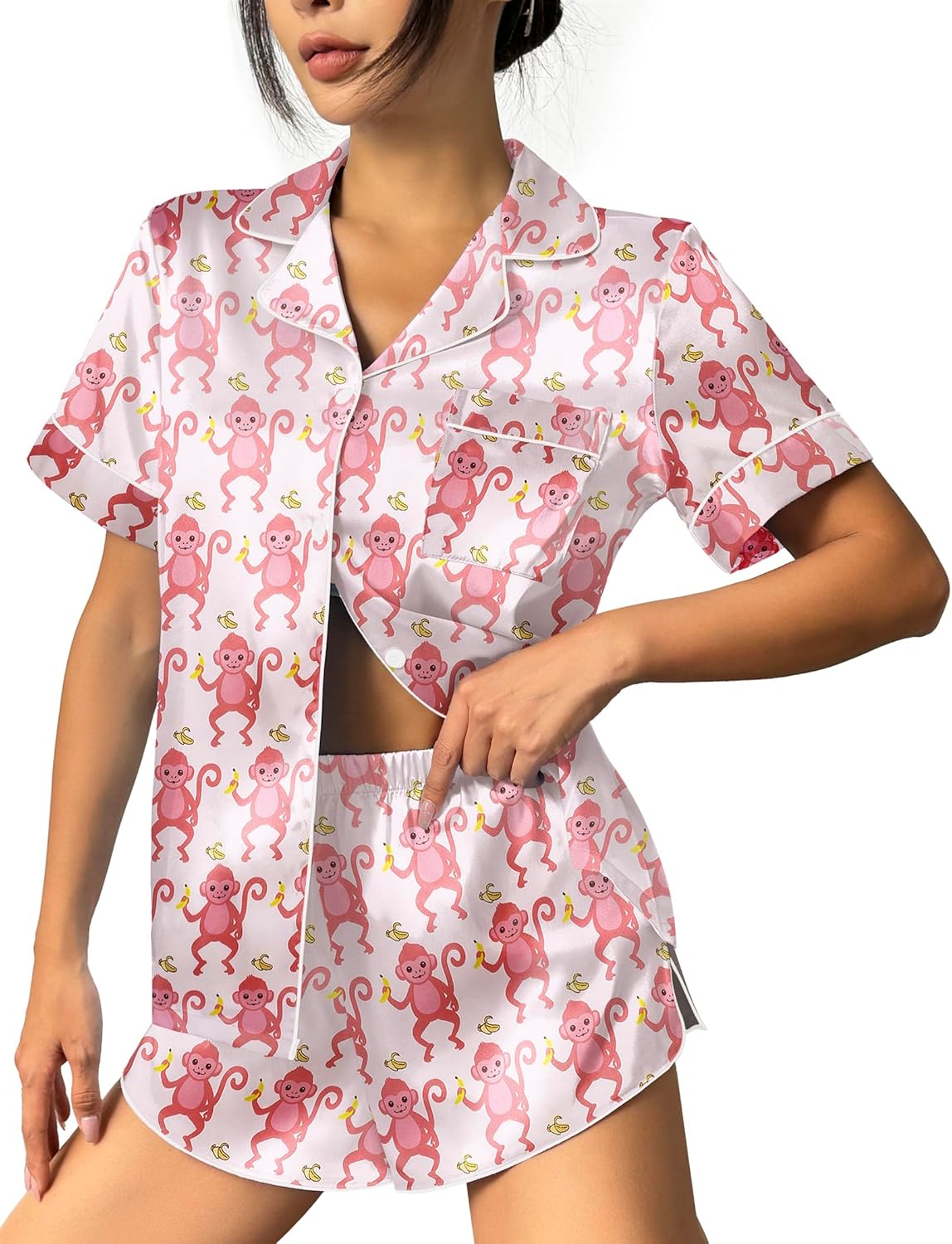 Silk-satin pajama set with pink monkey print button-up shirt and matching shorts