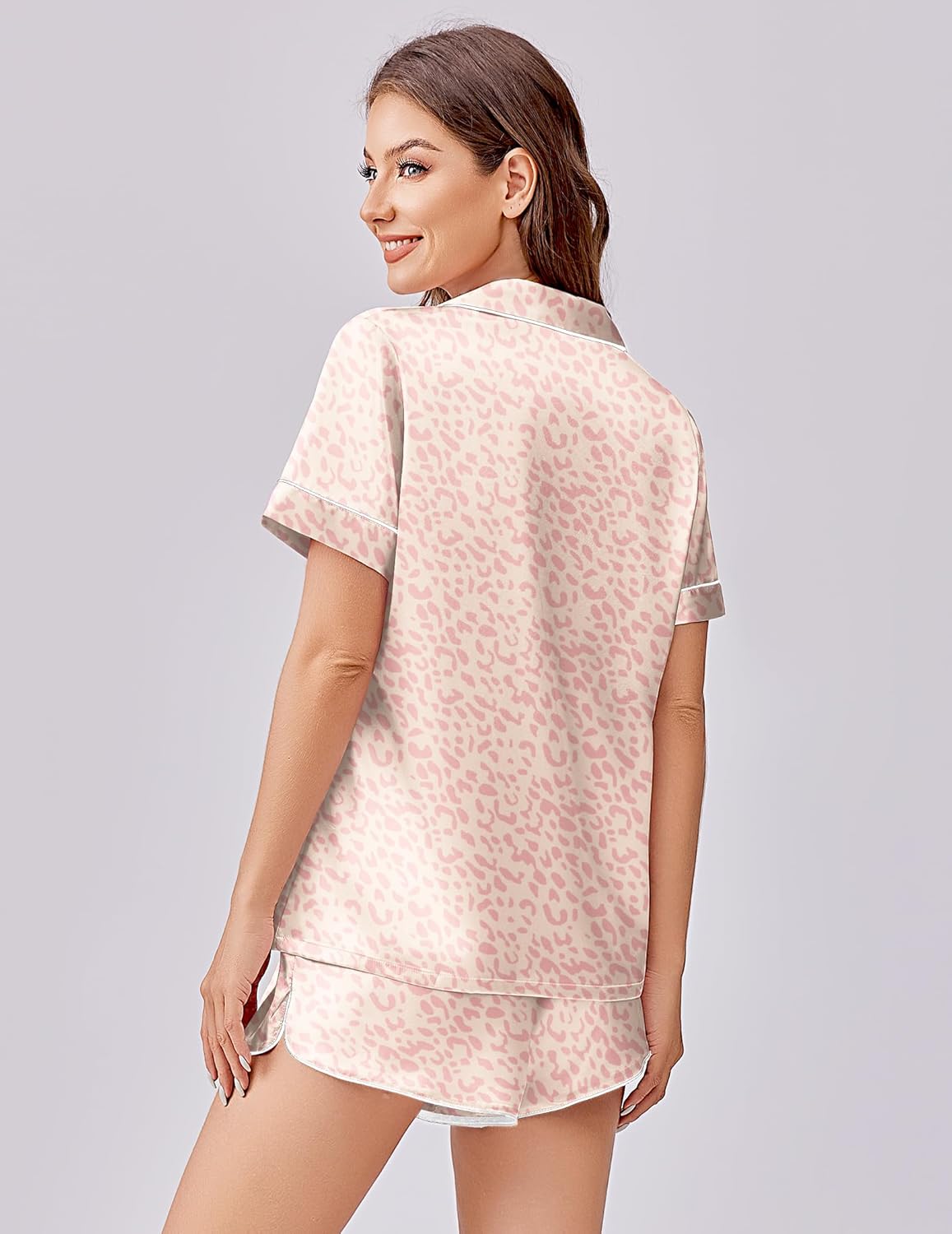 Pink leopard print satin pajama set, button-front top and matching shorts, back view