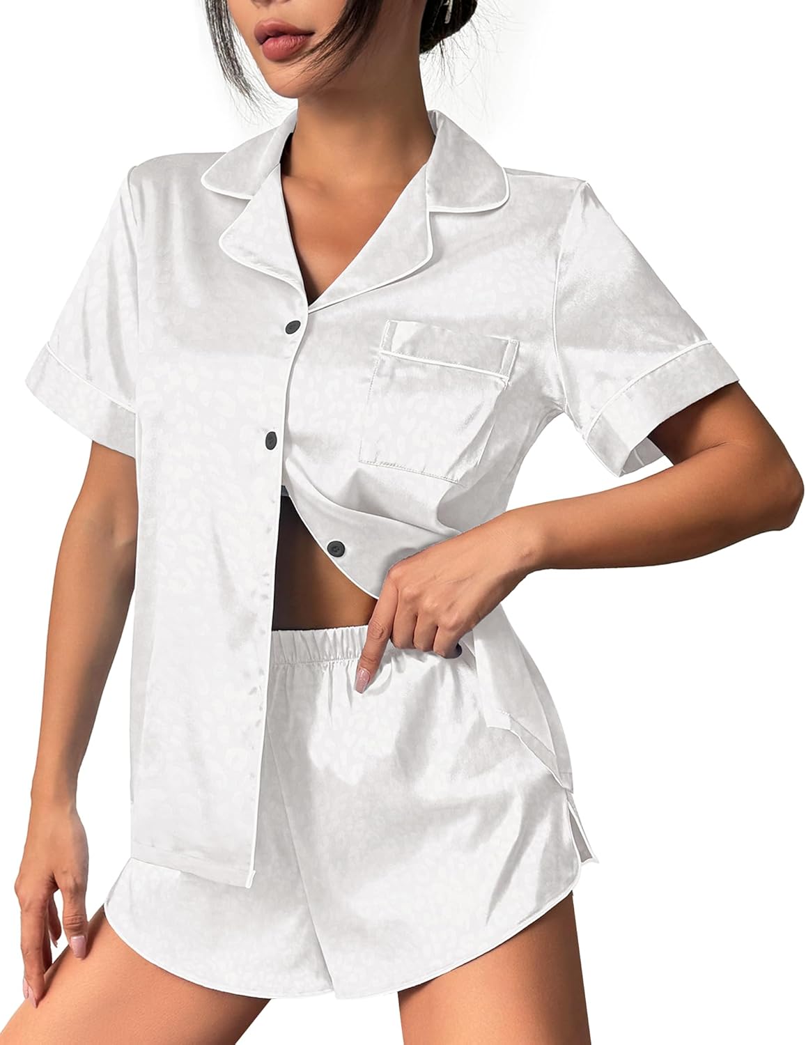 White satin pajama set with button-up short-sleeve shirt and drawstring shorts