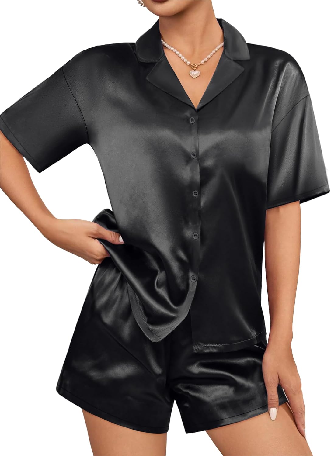 Black satin pajama set with short-sleeve button shirt and matching shorts