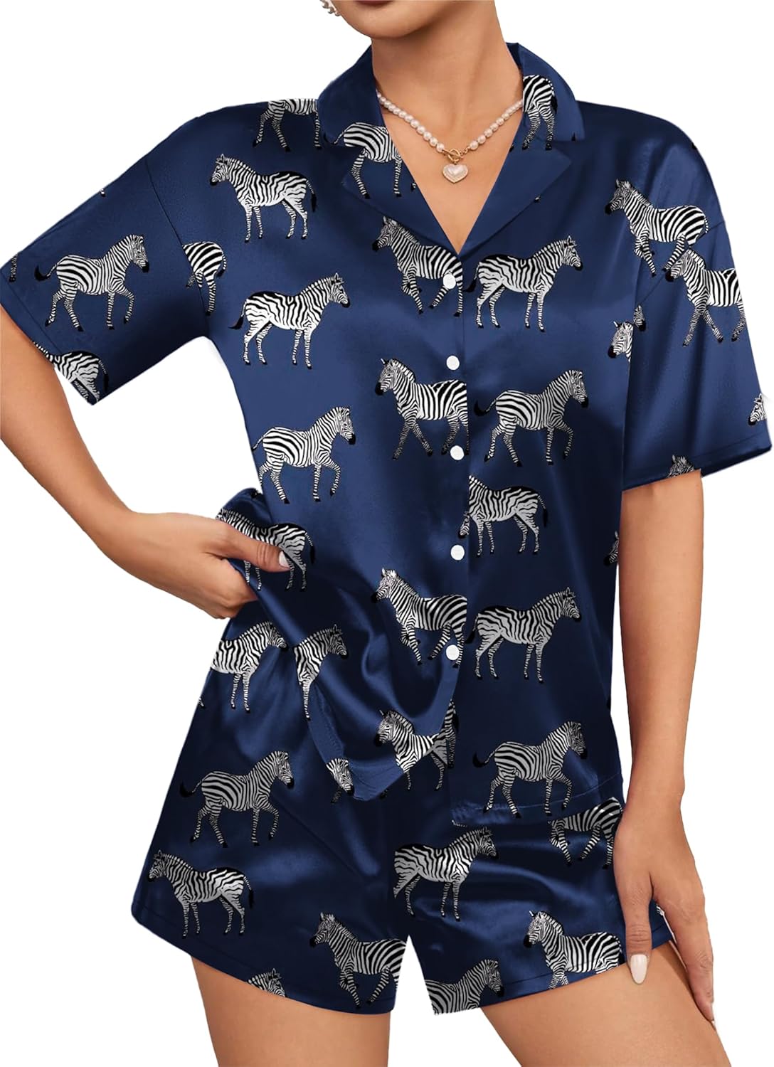 Navy satin pajama set with zebra print, short-sleeve button shirt and matching shorts