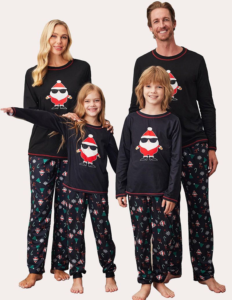 Christmas family pajama set: black tops with Santa graphic, dark patterned pajama pants