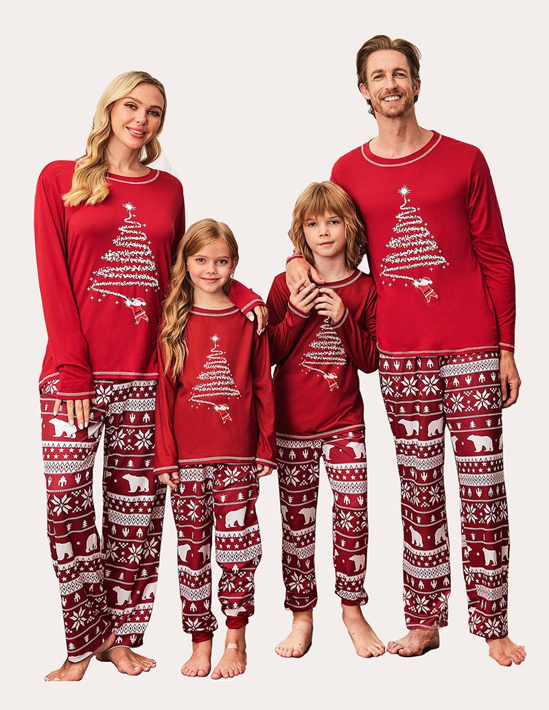 Christmas family pajama set: red tops with tree motifs, red patterned pajama pants