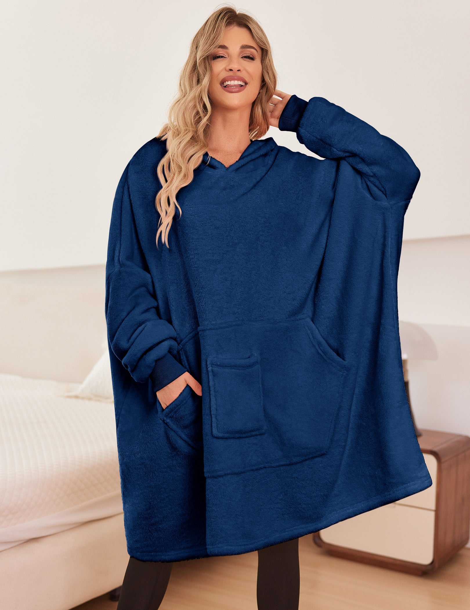 Dark blue oversized hooded bathrobe with front pouch pockets and long sleeves