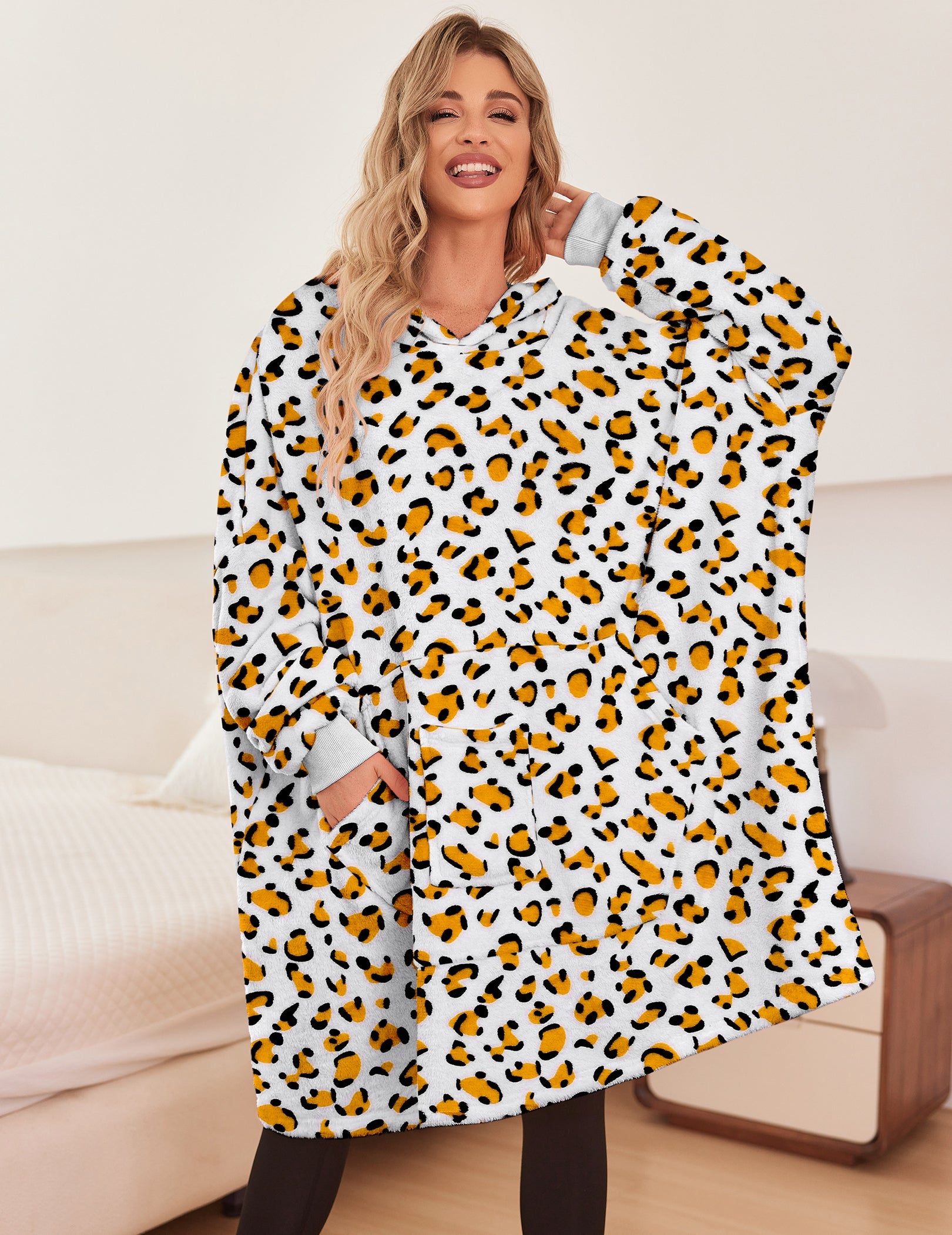 White leopard-print oversized hooded bathrobe with front pouch pockets and long sleeves