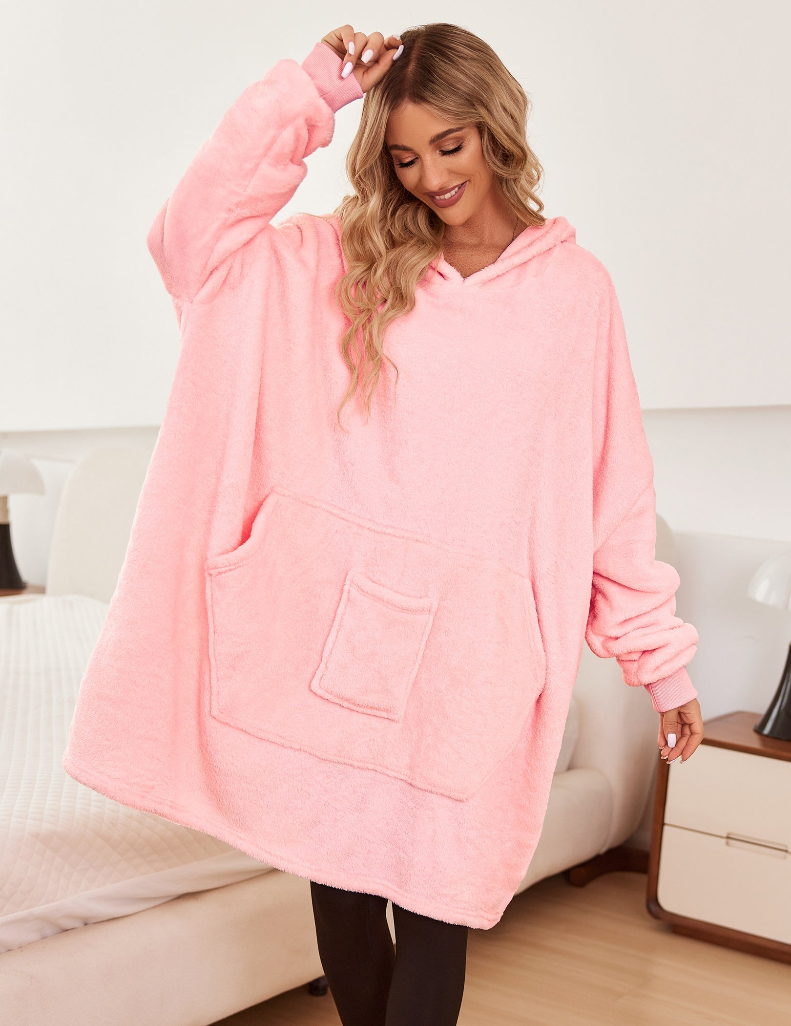 Pink oversized hooded bathrobe with front pouch pocket and long sleeves