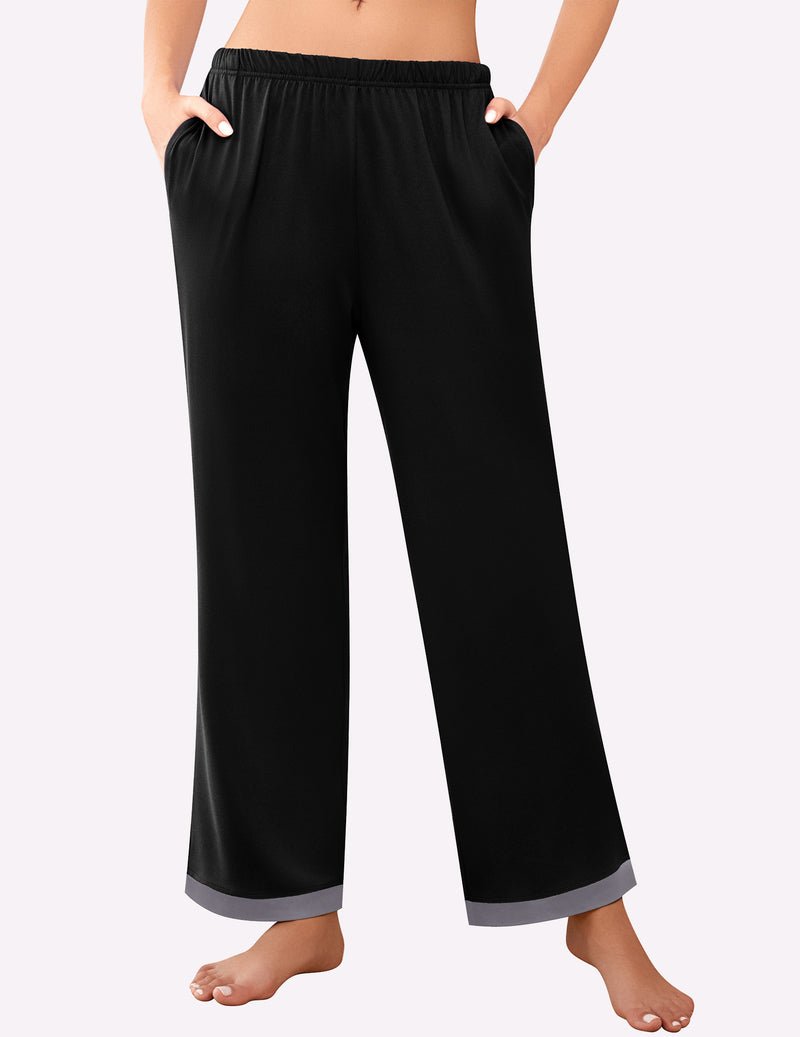Black pajama pants with elastic waistband and smooth fabric, wide cuff hem