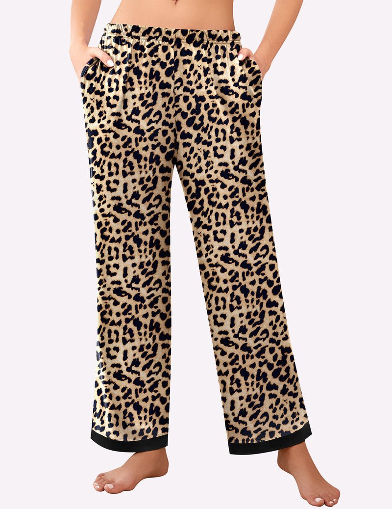 Leopard print pajama pants in tan and dark brown with elastic waistband and wide cuffs