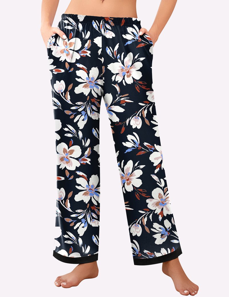 Black floral pajama lounge pants with elastic waistband and wide straight legs
