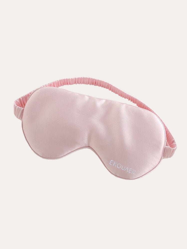 Pink satin sleep eye mask with curved eye shape and elastic band