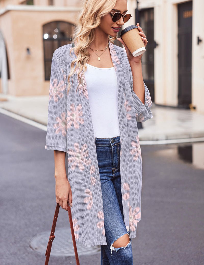 Light blue waffle-knit robe with peach flower print, open front and tie belt