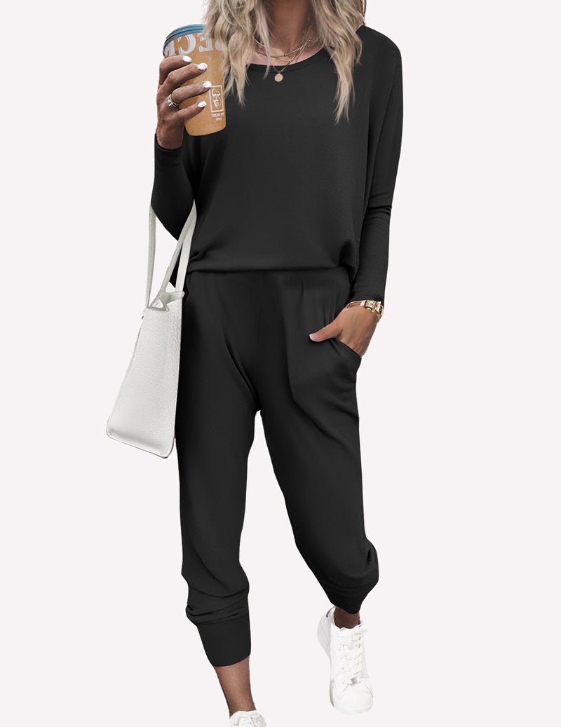 Black pajama set with long sleeves, elastic-waist jogger pants and cuffed hems